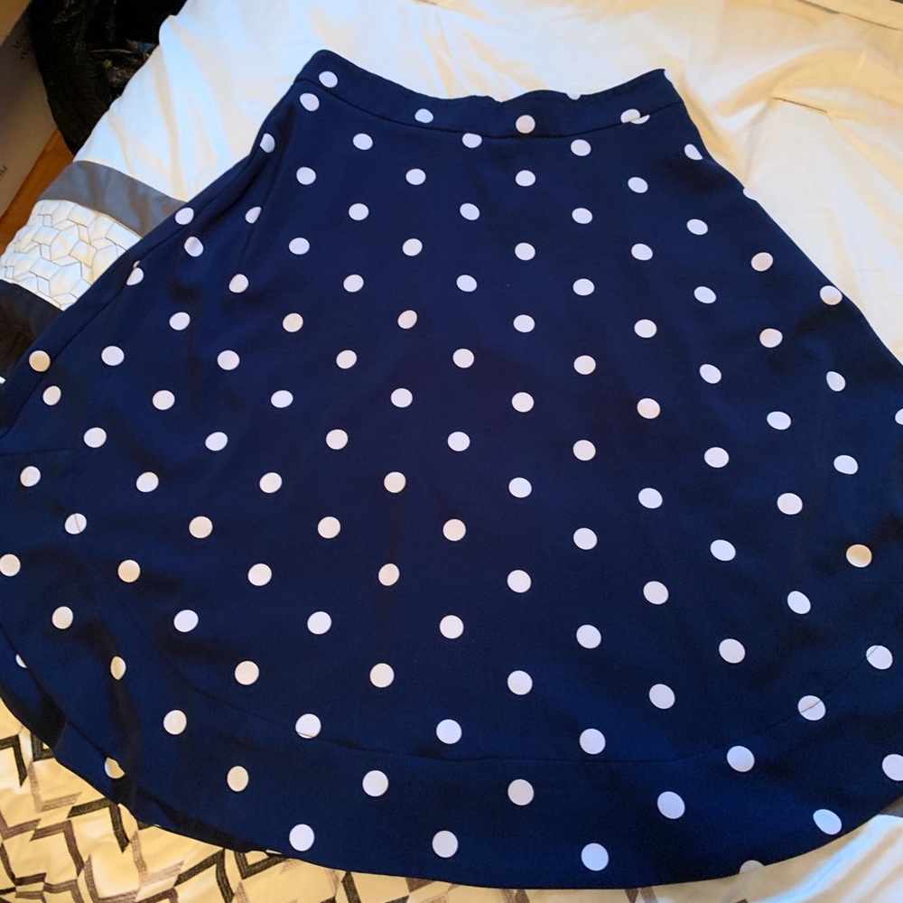 Blue skirt with white polka dots